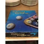 A BOX OF PROFESSIONAL POOL BALLS, AS NEW