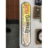 A LARGE CAST 'GUINNESS EXTRA STOUT' SIGN 56CM X 12CM