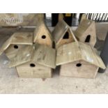 AN ASSORTMENT OF SIX WOODEN BIRD BOXES