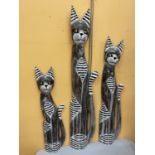 THREE WOODEN GRADUATED STANDING CATS TALLEST BEING 95CM