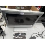 A TOSHIBA 20" TELEVISION WITH REMOTE CONTROL