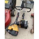 A SABRE PETROL GRASS STRIMMER AND A FURTHER PETROL GRASS STRIMMER