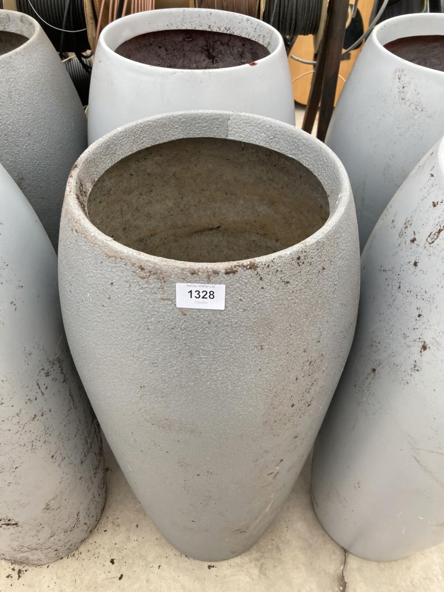 A PAIR OF ROUND GREY FIBRE GLASS PLANTERS (H:80CM)