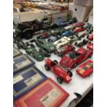 A LARGE COLLECTION OF VINTAGE RACING CAR MODELS AND SEVERAL PHOTO ALBUMS SHOWING MODEL DIARAMAS