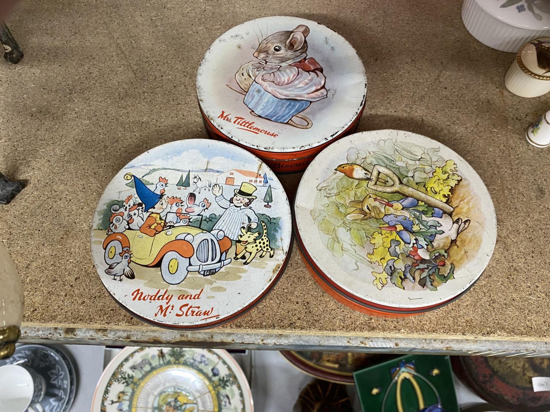 THREE VINTAGE HUNTLEY AND PALMERS BISCUIT TINS, MRS TITTLEMOUSE, BENJAMIN BUNNY AND NODDY AND MR