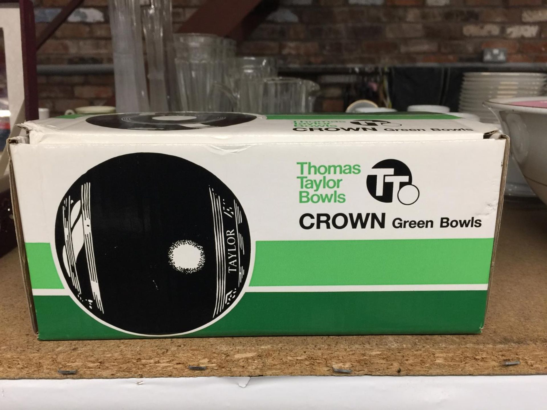 A SET OF THOMAS TAYLOR CROWN GREEN BOWLS NEW IN BOX WEIGHT 2lbs 6oz