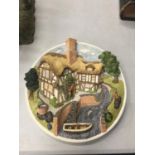 A BOXED DAVID WINTER COTTAGES WALL PLAQUE