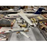 TWO MODEL PLANES ON STANDS TO INCLUDE NATIONAL AIR AND JET SOLUTIONS