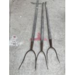 THREE VINTAGE WOODEN HANDLED PITCH FORKS