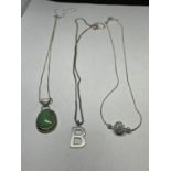 THREE MARKED SILVER NECKLACES WITH PENDANTS