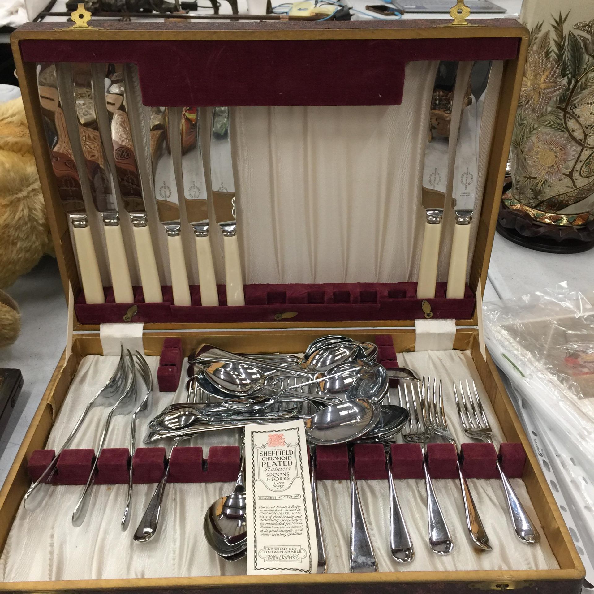A BOXED SHEFFIELD CHROMOID PLATED PART CANTEEN OF CUTLERY