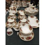 A QUANTITY OF ROYAL ALBERT 'OLD COUNTRY ROSES' TO INCLUDE DINNER PLATES, TRIOS, TEAPOT, BOWLS