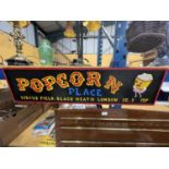 A LARGE WOODEN POPCORN SIGN 100CM X 25CM