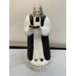 A STAFFORDSHIRE FIGURE OF JOHN WESLEY