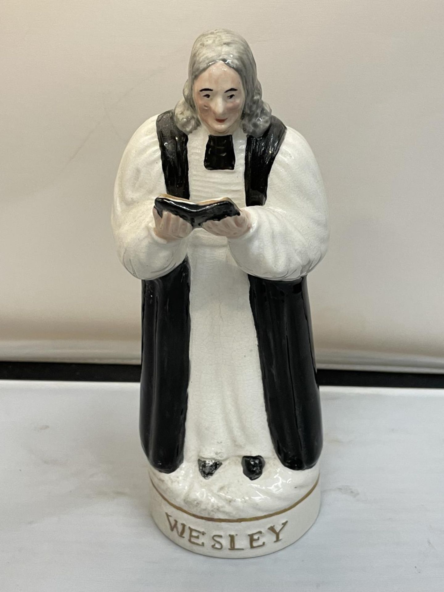 A STAFFORDSHIRE FIGURE OF JOHN WESLEY