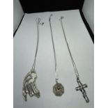THREE MARKED SILVER NECKLACES WITH TO INCLUDE A CROSS AND A SPIDER IN ITS WEB