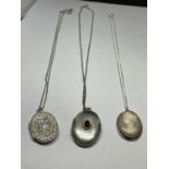 THREE MARKED SILVER NECKLACES TWO WITH LOCKETS ONE WITH A CAMEO