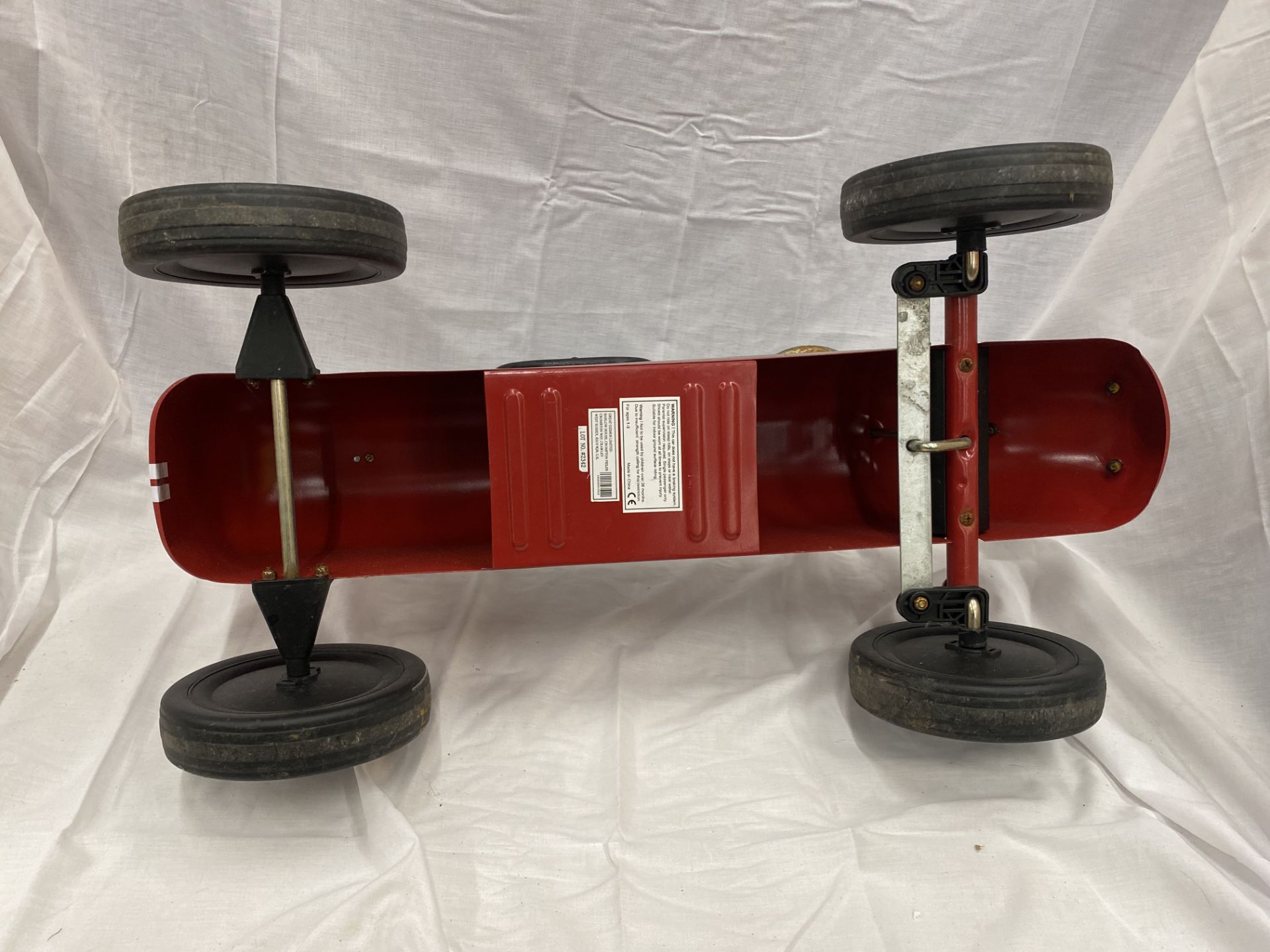 A VINTAGE CHILD'S RIDE-ON PUSH ALONG TIN RACING CAR WITH WORKING STEERING - Image 16 of 18