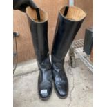 A PAIR OF VINTAGE LEATHER RIDING BOOTS