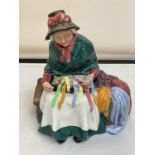 A ROYAL DOULTON FIGURINE SILKS AND RIBBONS HN 2017