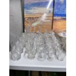 A QUANTITY OF GLASSES TO INCLUDE TUMBLERS, SHERRY, WINE, PORT, VASES, ETC