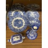 A QUANTITY OF BLUE AND WHITE POTTERY TO INCLUDE A RINGTONS TEAPOT, ENOCH WEDGWOOD PLATES, ETC