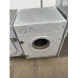 A WHITE INTERGRATED CDA TUMBLE DRYER