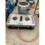 A GELERT GAS STOVE AND A PRESSURE COOKING POT