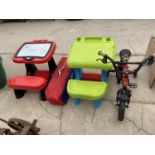 AN ASSORTMENT OF CHILDRENS ITEMS TO INCLUDE TWO DESKS AND A BIKE ETC