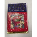 A FIRST EDITION HARRY POTTER AND THE PHILOSOPHER'S STONE BY J K ROWLING