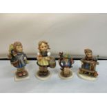 FOUR WEST GERMAN HUMMEL FIGURES - CONRATULATIONS, GIRL STANDING AT FENCE TALKING TO BIRD, GIRL