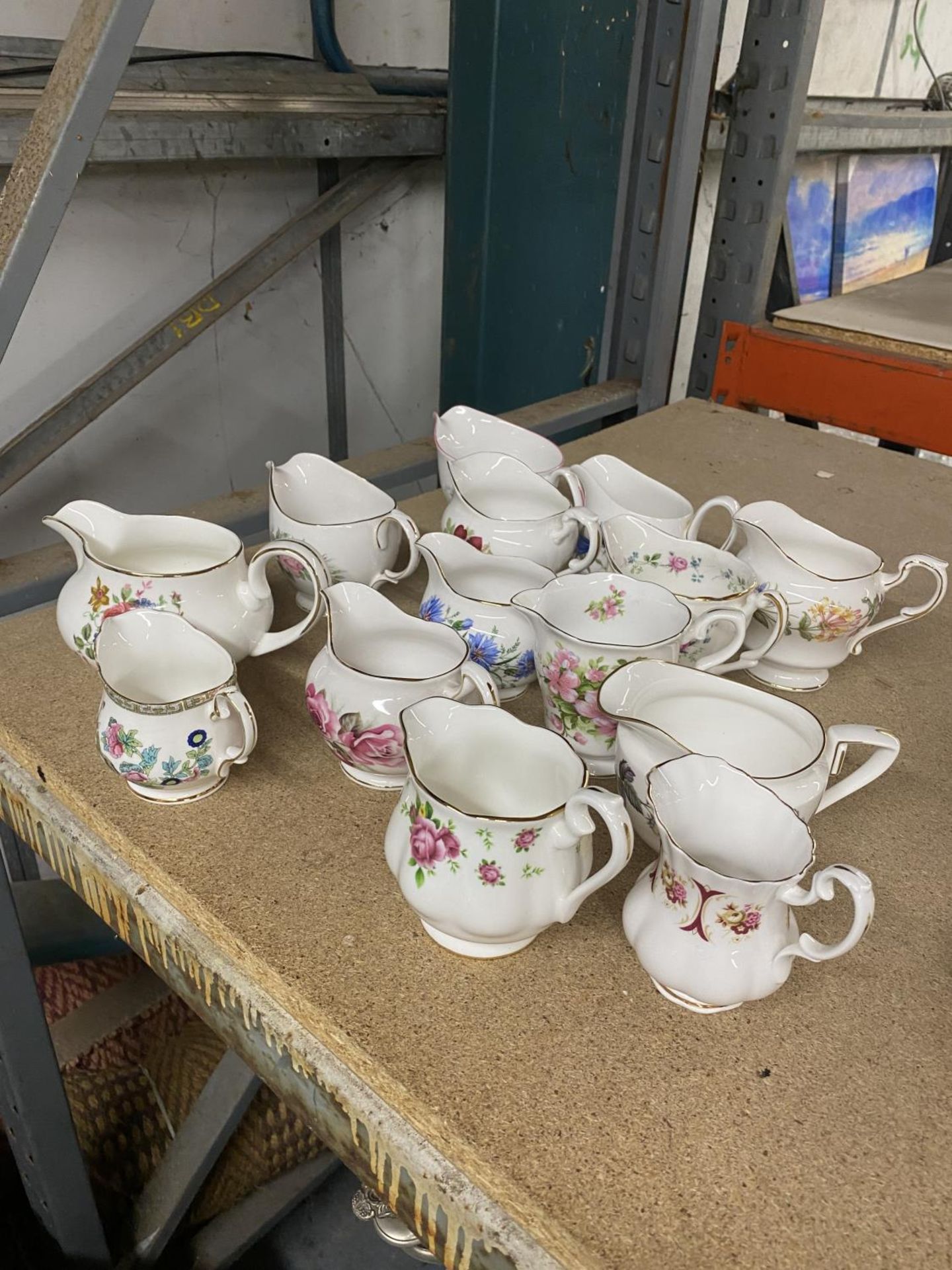 A QUANTITY OF CHINA JUGS TO INCLUDE ROYAL ALBERT, DUCHESS, ROYAL WORCESTER, ETC