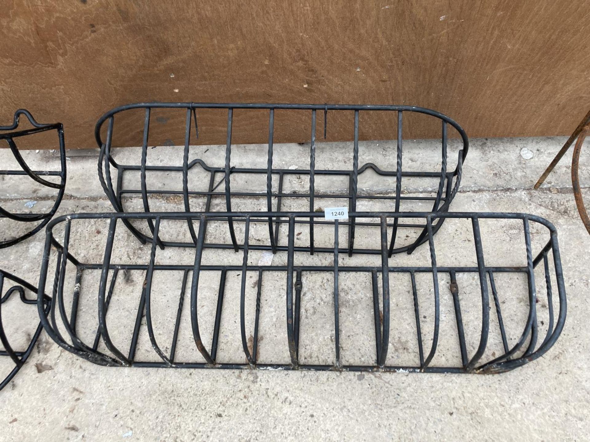 A PAIR OF WROUGHT IRON HAY RACK PLANTERS - Image 2 of 2