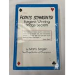 A COPY OF POINTS SCHMOINTS! BERGEN'S WINNING BRIDGE SERIES SIGNED BY THE AUTHOR MARTY BERGEN