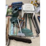 AN ASSORTMENT OF GARDEN TOOLS TO INCLUDE SHEARS, WATERING CANS AND SPADES ETC