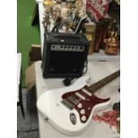 A SQUIER WHITE ELECTRIC GUITAR AND A BENSON AMPLIFIER