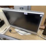 A PANASONIC 23" TELEVISION WITH REMOTE CONTROL
