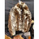 A LADIES FUR COAT