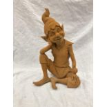 A CAST RUSTY GARDEN PIXIE - HEIGHT 37CM