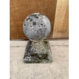 A ROUND RECONSTITUTED STONE FINIAL (H:50CM)