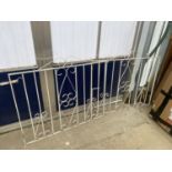 A PAIR OF DECORATIVE WROUGHT IRON GARDEN GATES (W:125CM H:102CM EACH)