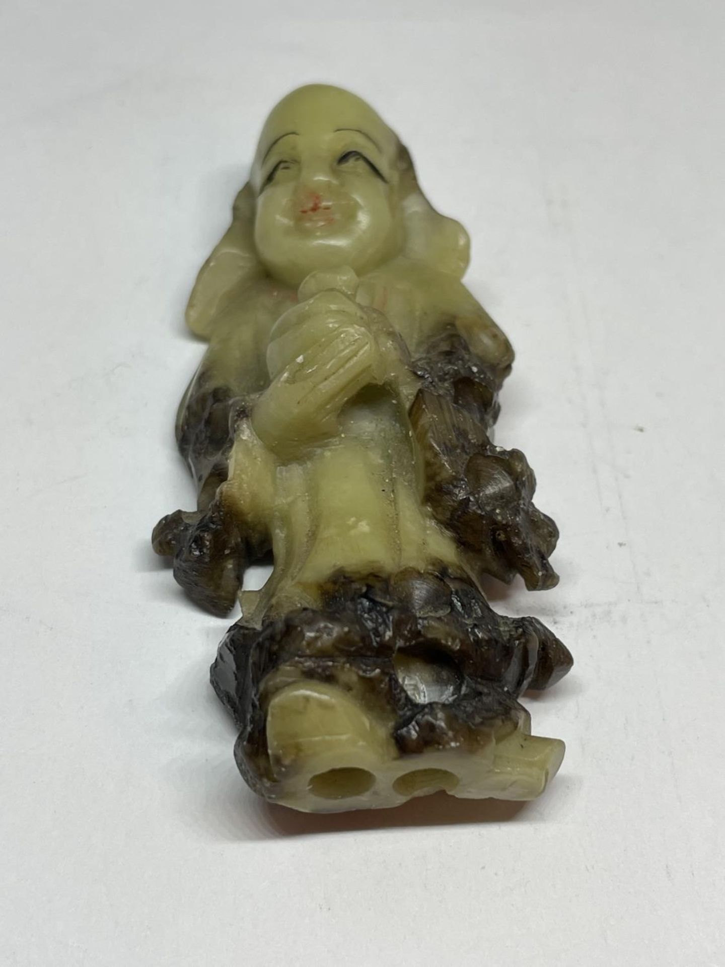 AN ORIENTAL JADE BUDDHA