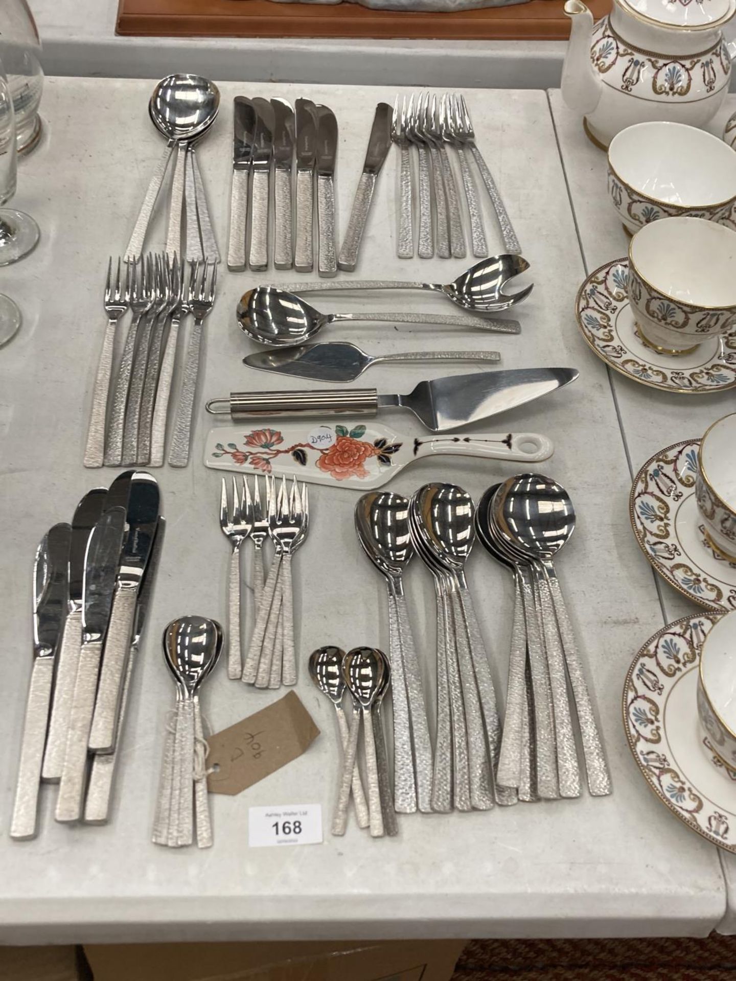 A QUANTITY OF FLATWARE TO INCLUDE KNIVES, FORKS, SPOONS, SERVERS, ETC