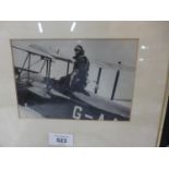 A FRAMED BLACK AND WHITE PHOTO OF AMY JOHNSON AT CROYDON AIRPORT, PHOTO 11.5X17CM