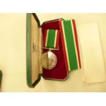 A BOXED WOMENS VOLUNTARY SERVICE MEDAL