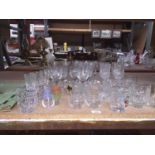 A QUANTITY OF GLASSES TO INCLLUDE WINE, SHERRY, SHOT GLASSES, TUMBLERS, ETC