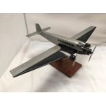 A LUFTHANSA JUNKERS JU 52 GERMAN BOMBER MODEL PLANE ON STAND