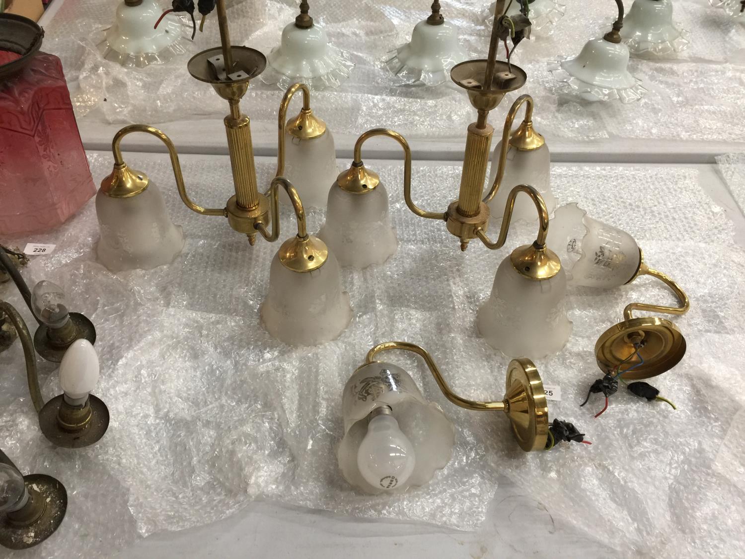 A PAIR OF VINTAGE BRASS THREE BRANCH CEILING LIGHTS WITH FROSTED GLASS. DROP 28.5CM, WIDTH 42CM,