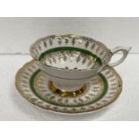 A ROYAL STAFFORD CABINET CUP AND SAUCER