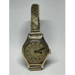 A 9CT GOLD CASED MECHANICAL LADY'S WRISTWATCH BY BUTT & CO LTD OF CHESTER, WORKING AT THE THE TIME